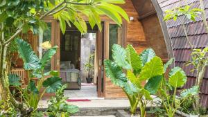 Ein Garten an der Unterkunft Lullabi Lumbung Villa