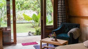 Ein Garten an der Unterkunft Lullabi Lumbung Villa