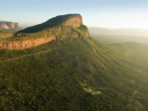 an aerial view of a mountain in the desert at Monomotapa Village @ Legend Golf and Safari Resort in Golders Green