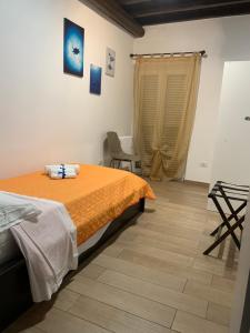 Posteľ alebo postele v izbe v ubytovaní Casa Vacanze Historic House