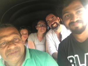 a group of people sitting in the back of a car at location weligama in Weligama
