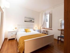 Postel nebo postele na pokoji v ubytování The Best Rent - Stylish one-bedroom apartment in Piazza Barberini