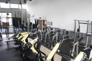 Posilňovňa alebo fitness centrum v ubytovaní Cottages de France CDG