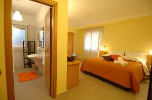 Posteľ alebo postele v izbe v ubytovaní Hotel Arimannia