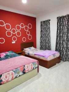 Cama ou camas em um quarto em EZ Roomstay