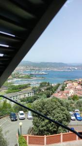 a view of the ocean from a balcony at La MAGIA NEL BORGO in Fezzano