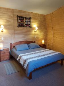 Postel nebo postele na pokoji v ubytování Cabañas Domo Pucón
