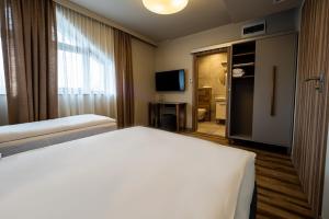 Villa & Gospoda Krakowska客房内的一张或多张床位
