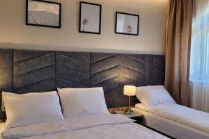 Villa & Gospoda Krakowska客房内的一张或多张床位