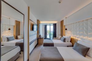 O zonă de relaxare la Signature Blue Resort Kuşadası +36 fotografii
