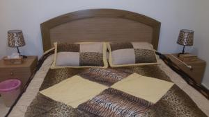 Postel nebo postele na pokoji v ubytování Hotel St Jean