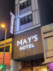 a maks hotel sign on the side of a building at Mays Hotel- Ben Thanh Market in Ho Chi Minh City