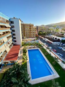 Bazén v ubytování LOFT vistas playa jardin nebo v jeho okolí