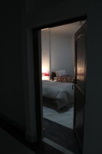 Postel nebo postele na pokoji v ubytování HOTEL BODHGAYA INN