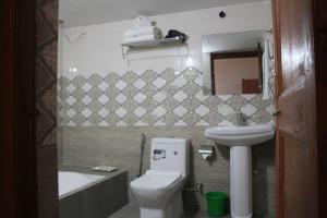 Koupelna v ubytování HOTEL BODHGAYA INN