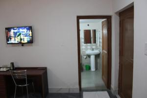 Koupelna v ubytování HOTEL BODHGAYA INN