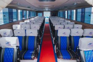 an empty train car with blue and white seats at Anugerah Villas in Amed