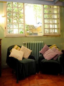 A seating area at Residenza Branca Della Ripa