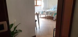 A bed or beds in a room at Le Rustiche Foresteria