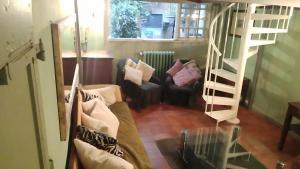 A seating area at Residenza Branca Della Ripa
