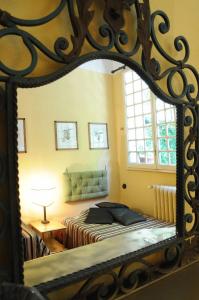 A bed or beds in a room at Residenza Branca Della Ripa