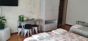 A bed or beds in a room at Le Rustiche Foresteria