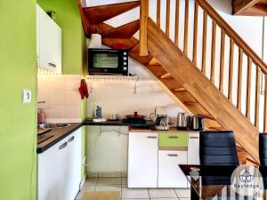 Photo de la galerie de l'établissement Cumin - Studio duplex avec accès piscine à St-Gilles, à Saint-Gilles les Bains