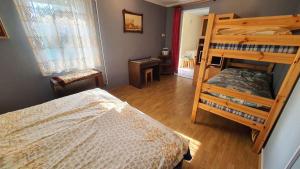 A bed or beds in a room at Holiday home in Balatonmariafürdo 43119