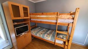A bed or beds in a room at Holiday home in Balatonmariafürdo 43119