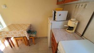 A kitchen or kitchenette at Holiday home in Balatonmariafürdo 43119
