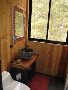 Postel nebo postele na pokoji v ubytování Casa Kleinbos en Pichilemu,Camino a Punta de Lobos + 26 fotografií