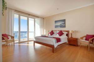 Postel nebo postele na pokoji v ubytování Casa del Mar - Amazing Villa with Sea View & Pool + 28 fotografií