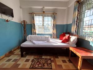 Kama o mga kama sa kuwarto sa R&R Guest House