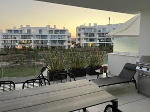 A balcony or terrace at New apartment in Higueron West