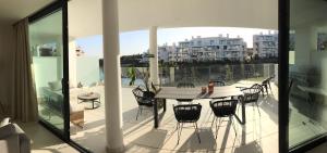 A balcony or terrace at New apartment in Higueron West
