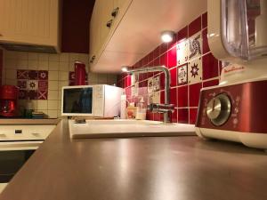 Kuchyňa alebo kuchynka v ubytovaní Centre Cauterets, appartement 72m2 pr 7 personnes