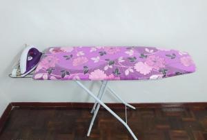 a purple cushion on top of a table at PD Laguna Homestay Blue & Purple in Port Dickson
