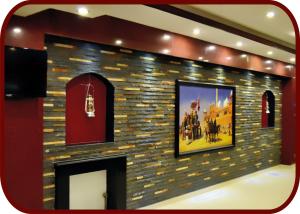 a brick wall with a fireplace in a room at Hotel de Palazzo in Islamabad +20 photos