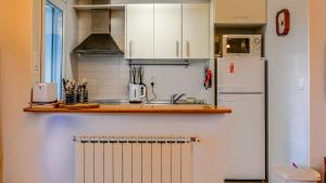 Kuchyň nebo kuchyňský kout v ubytování Townhouse on La Torre Comfortable 2 Bedroom 2 Bathroom - LA188LT