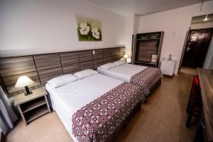 Cama ou camas em um quarto em Hotel Dan Inn Planalto São Paulo