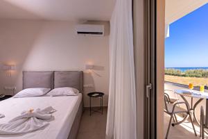 Posteľ alebo postele v izbe v ubytovaní Hotel Kathrin Beach