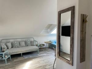 Posezení v ubytování Srní-Modrý podkroví byt /dvojdomek u hotelu Vydra
