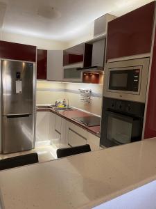 Kuchyň nebo kuchyňský kout v ubytování Apartamento Aguadulce Playa