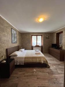 Postel nebo postele na pokoji v ubytování San Luigi - Rooms & Apartments