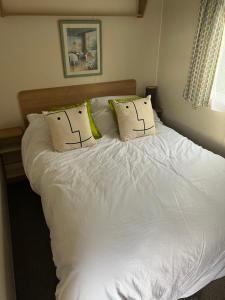 Lova arba lovos apgyvendinimo įstaigoje Stunning Hillside Sea View 2-Bed in Barmouth