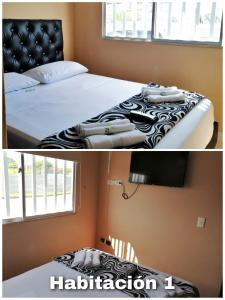 - une chambre avec un lit et une couverture noire et blanche dans l'établissement Apartahotel en el eje cafetero cerca al Parque del Café, à Montenegro