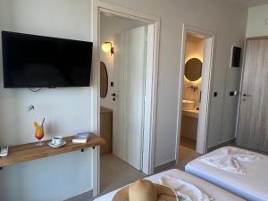 Posteľ alebo postele v izbe v ubytovaní Hotel Kathrin Beach