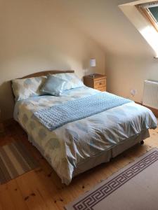 A bed or beds in a room at Atlantic View