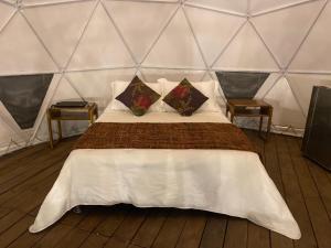 Postel nebo postele na pokoji v ubytování Ocobos Glamping