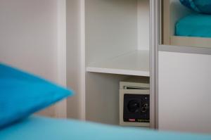 Postel nebo postele na pokoji v ubytování Apartments and Rooms Mišić